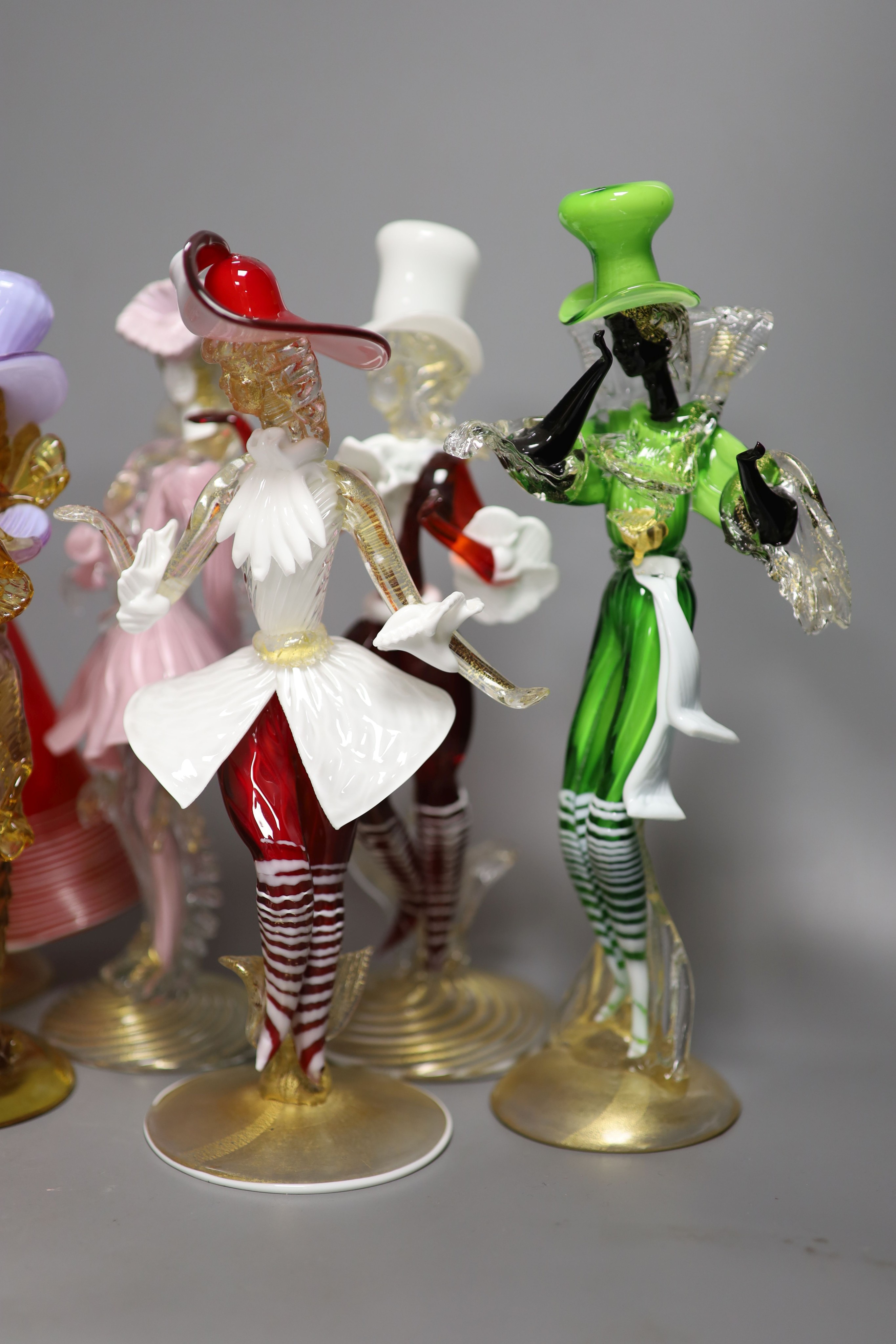 A group of eight Murano glass figures of dancers, tallest 32cm